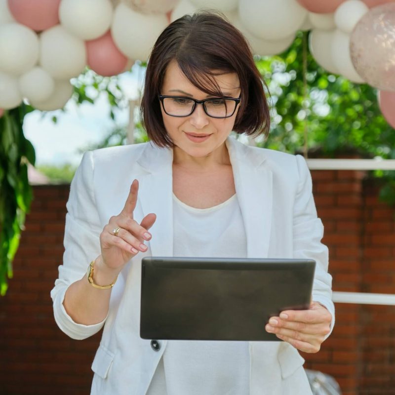 portrait-of-mature-business-woman-small-business-owner-organizing-events-parties-weddings.jpg